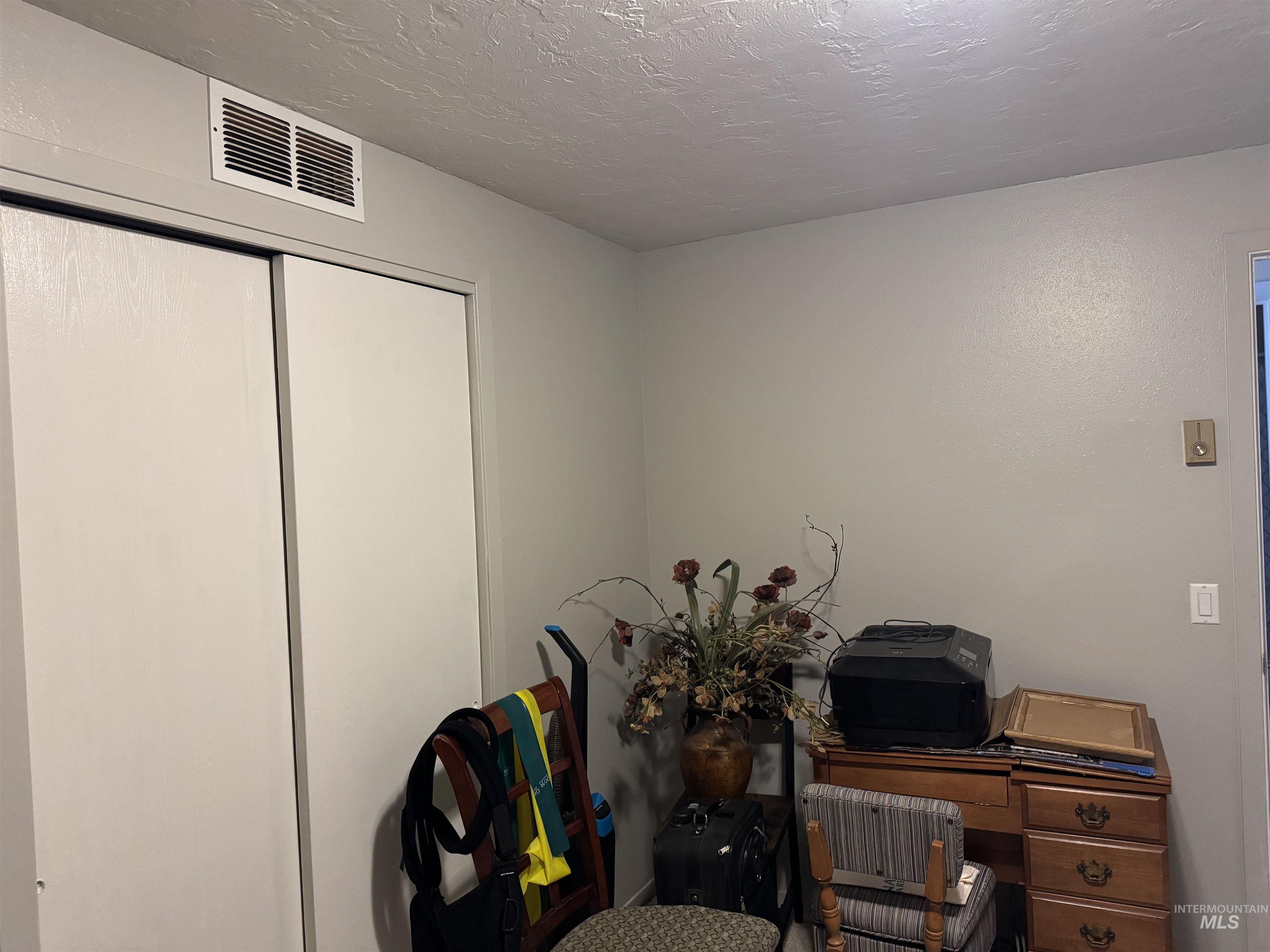 1145 Utah Street Gooding, ID 83330 - Photo 19 of 50 Home office with a textured ceiling
