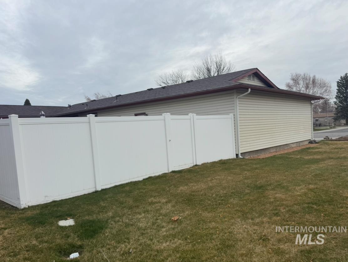 1145 Utah Street Gooding, ID 83330 - Photo 2 of 50 View of home's exterior featuring a shingled roof