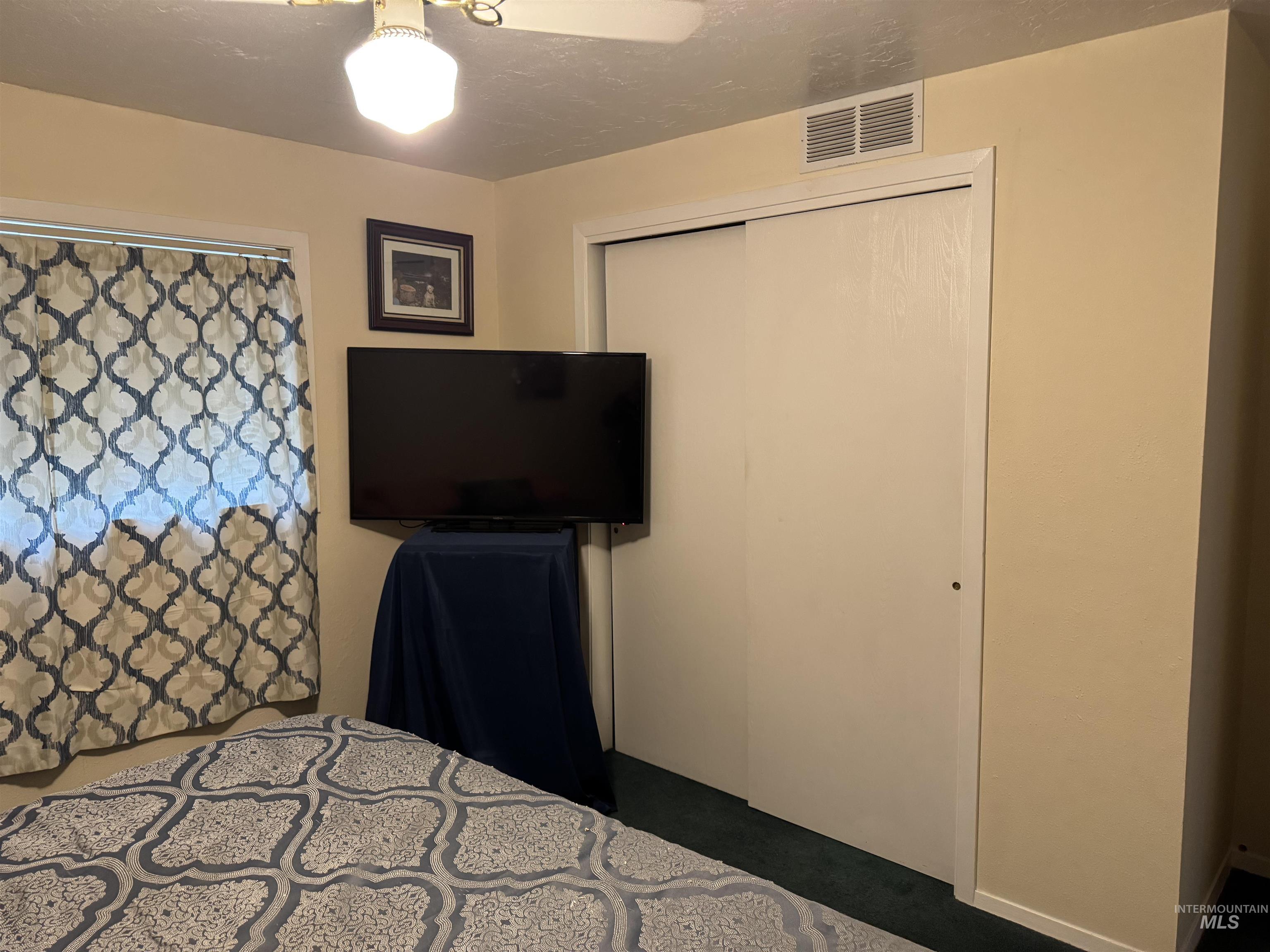 1145 Utah Street Gooding, ID 83330 - Photo 25 of 50 Bedroom with a closet and a ceiling fan
