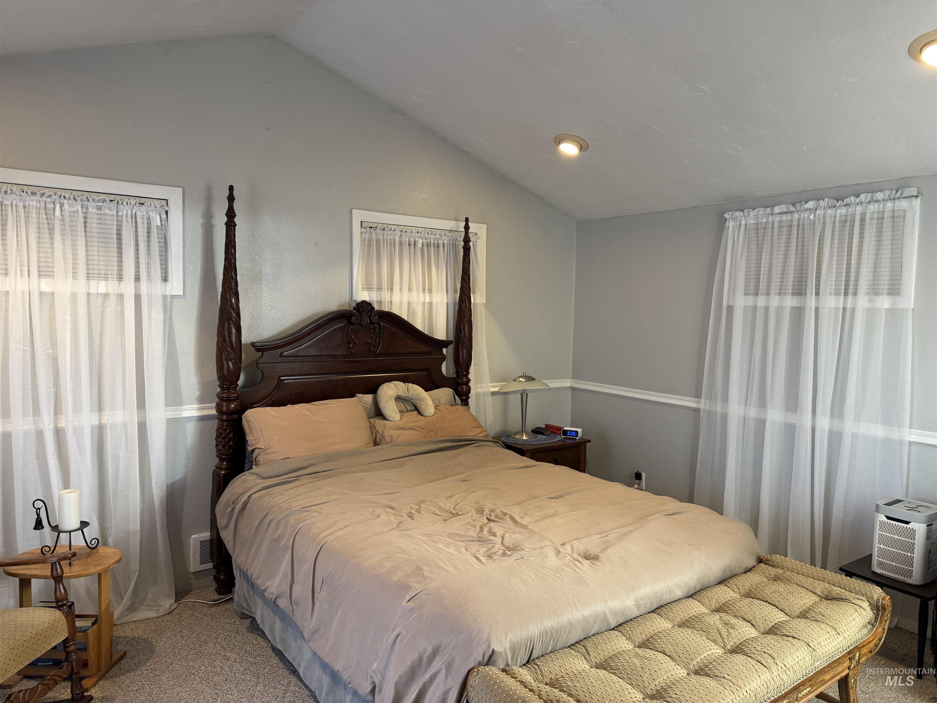 1145 Utah Street Gooding, ID 83330 - Photo 26 of 50 Bedroom featuring light colored carpet and vaulted ceiling