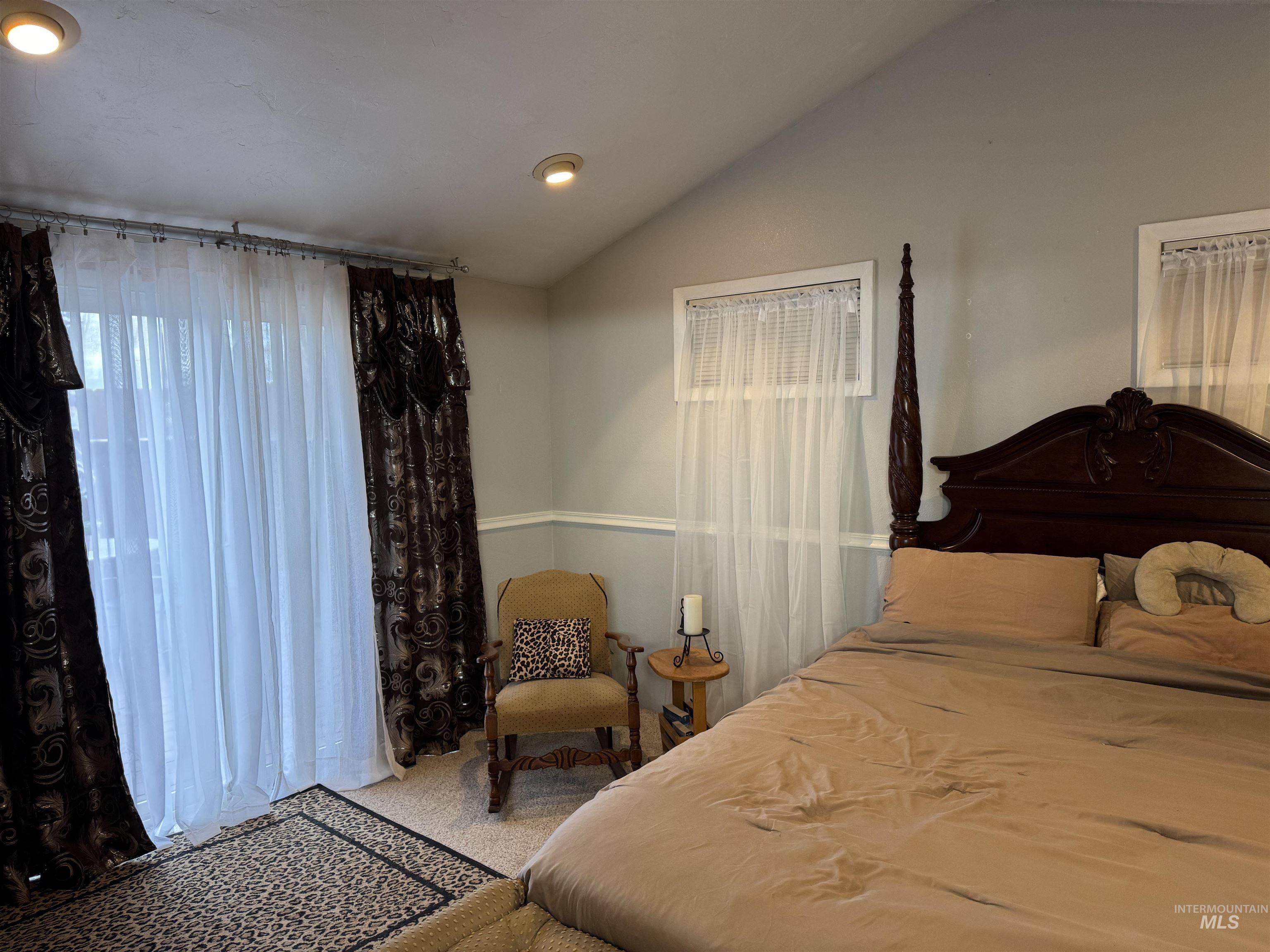 1145 Utah Street Gooding, ID 83330 - Photo 27 of 50 Carpeted bedroom with lofted ceiling
