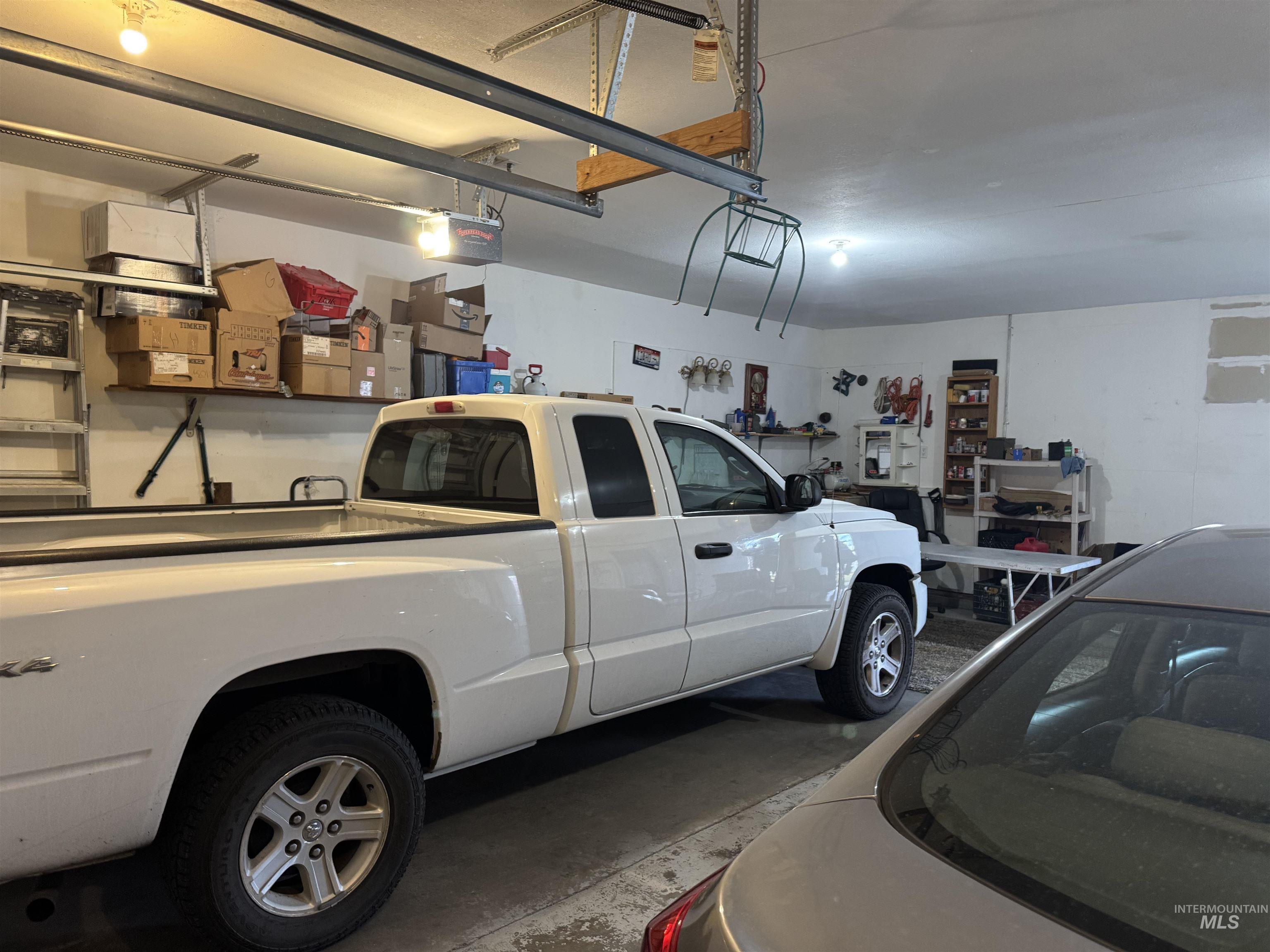 1145 Utah Street Gooding, ID 83330 - Photo 37 of 50 Garage with a garage door opener