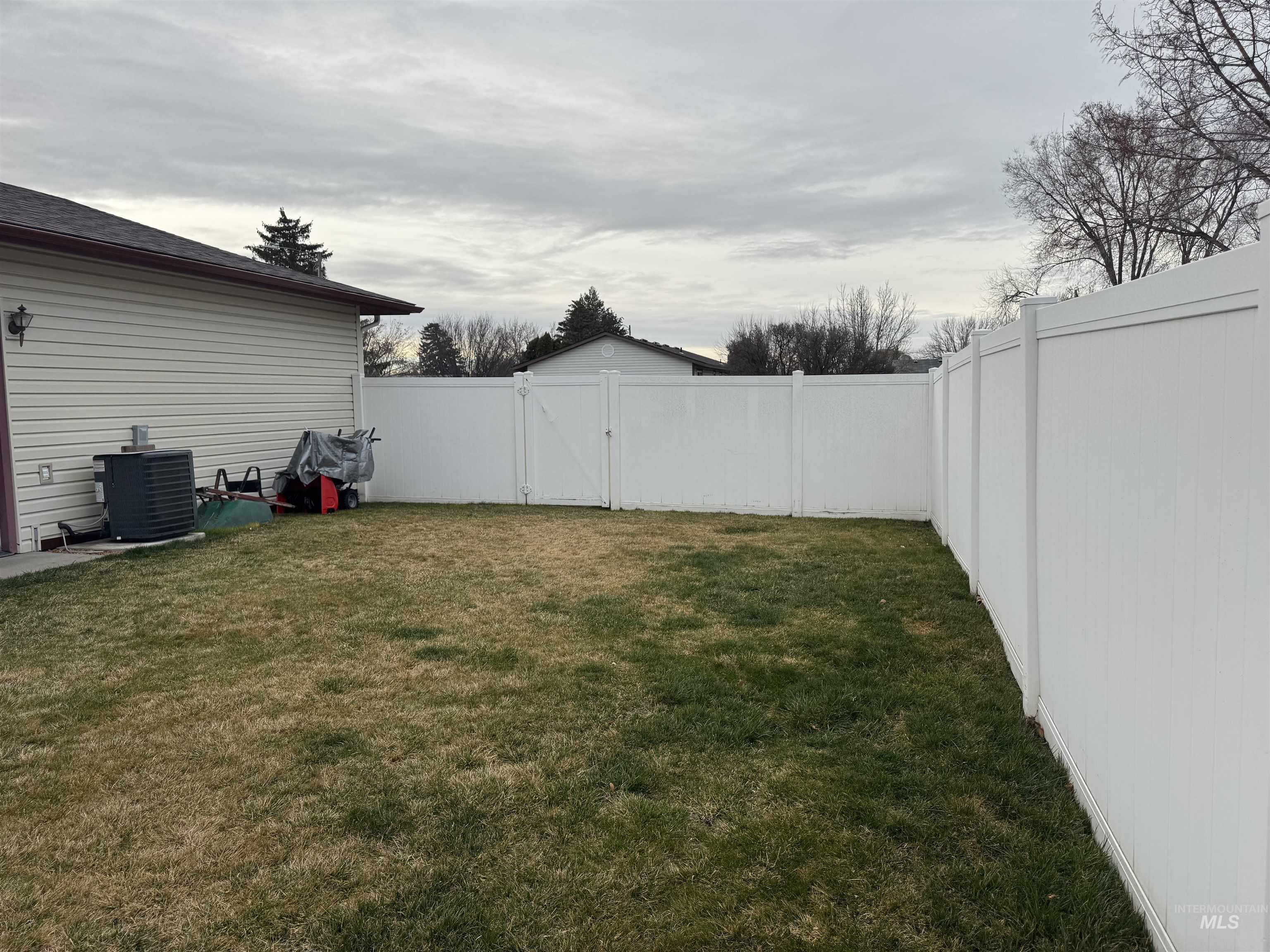 1145 Utah Street Gooding, ID 83330 - Photo 42 of 50 Fenced backyard featuring a gate