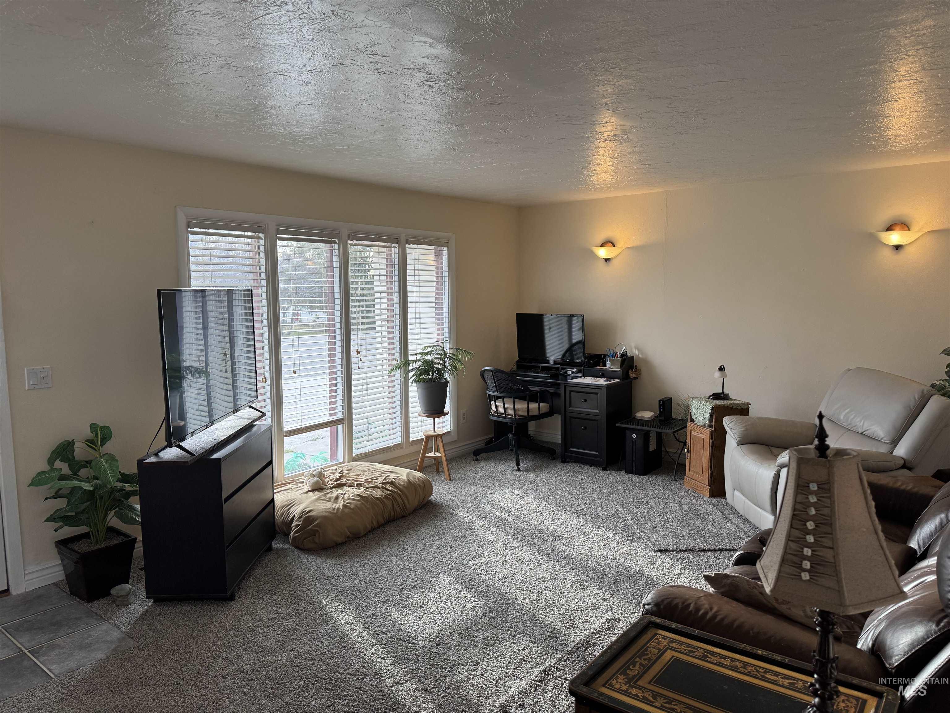 1145 Utah Street Gooding, ID 83330 - Photo 7 of 50 Carpeted office featuring a textured ceiling and baseboards