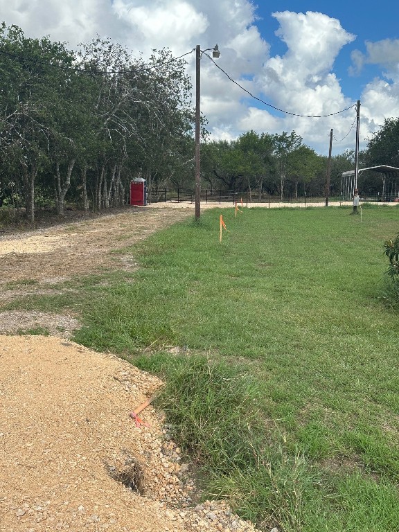 1316 Brownson Road Victoria, TX 77905 - Photo 6 of 9 a garden view with a lake view