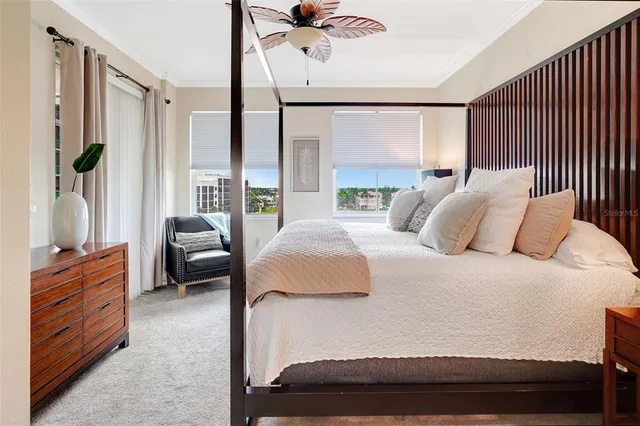 a bedroom with a bed couch and a dresser