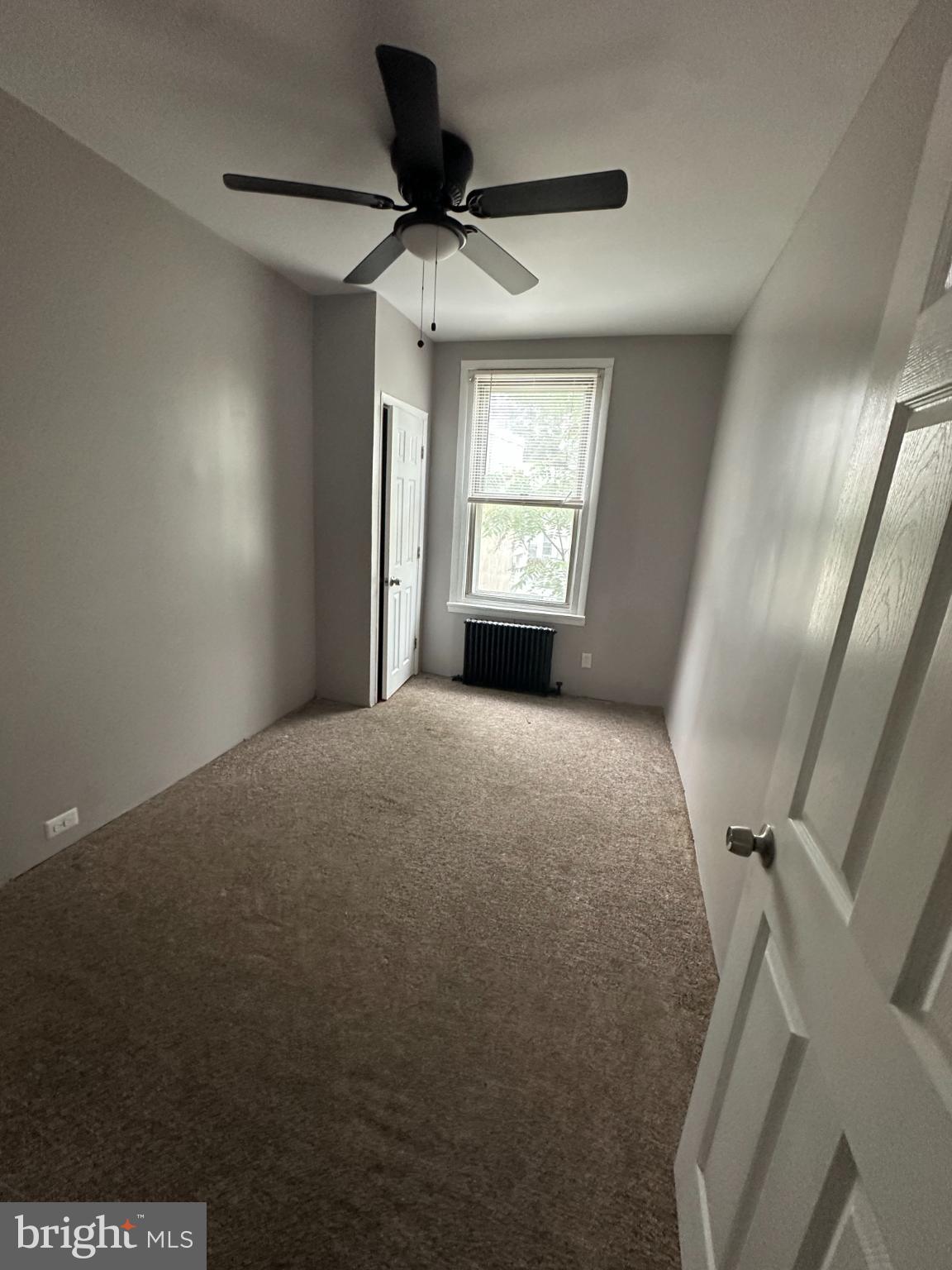 5913 Locust Street Philadelphia, PA 19139 - Photo 7 of 11 a view of an empty room and a window