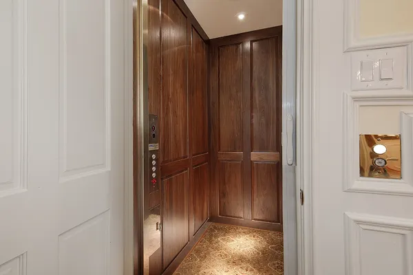 a bedroom with a bed and a fireplace