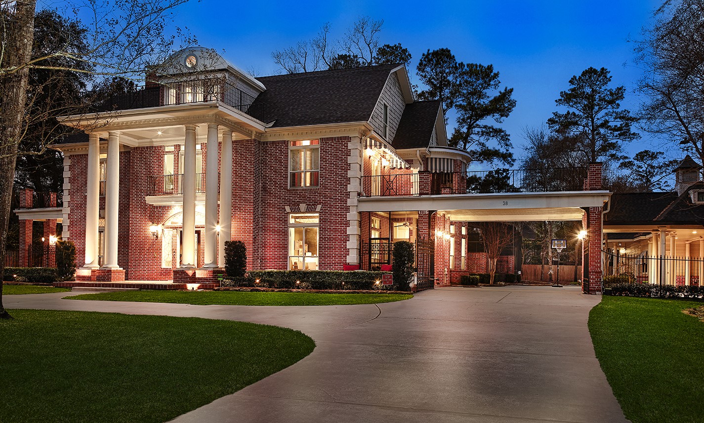 38 Grogans Point Road The Woodlands, TX 77380 - Photo 2 of 50 Gated porte-cochere leading to 3-car carriage house.