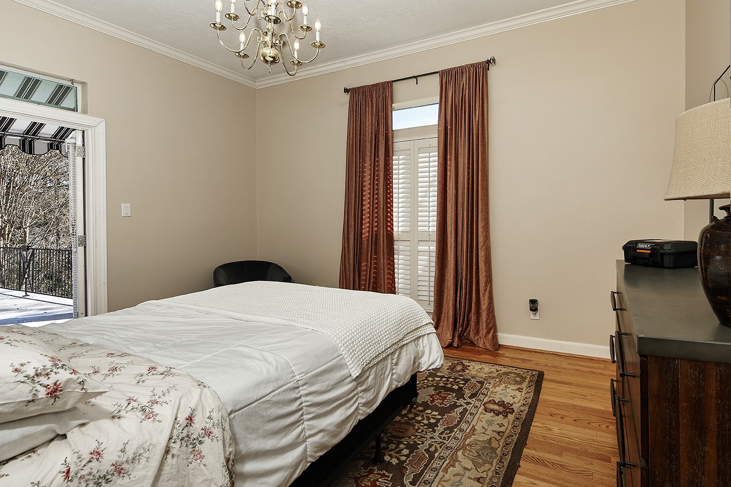 38 Grogans Point Road The Woodlands, TX 77380 - Photo 37 of 50 a bedroom with bed and window