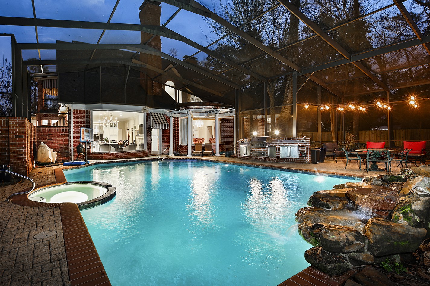 38 Grogans Point Road The Woodlands, TX 77380 - Photo 46 of 50 Enjoy this view of the gorgeous pool and spa and inside view of the house.