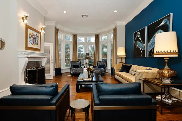 a view of a kitchen with refrigerator and windows