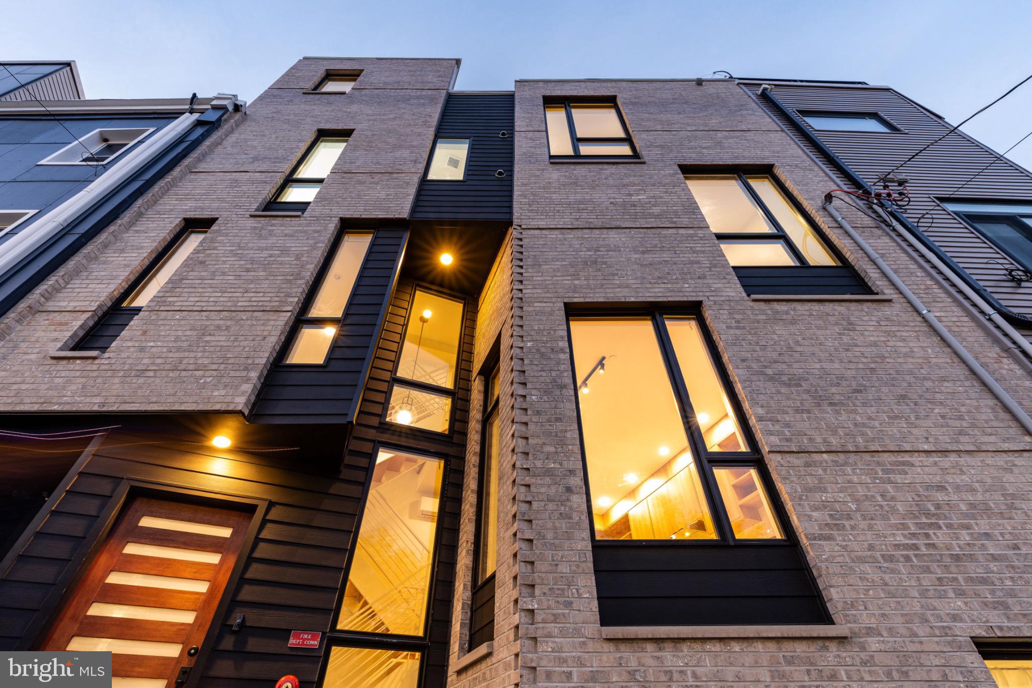 1606 North 4th Street Philadelphia, PA 19122 - Photo 3 of 82 Modern architectural elegance at twilight.