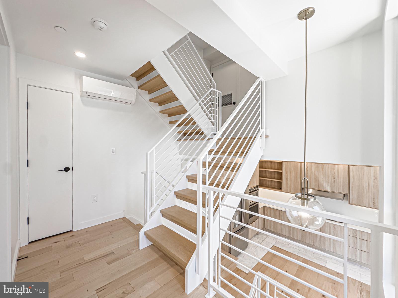 1606 North 4th Street Philadelphia, PA 19122 - Photo 46 of 82 Modern staircase with sleek design elements.