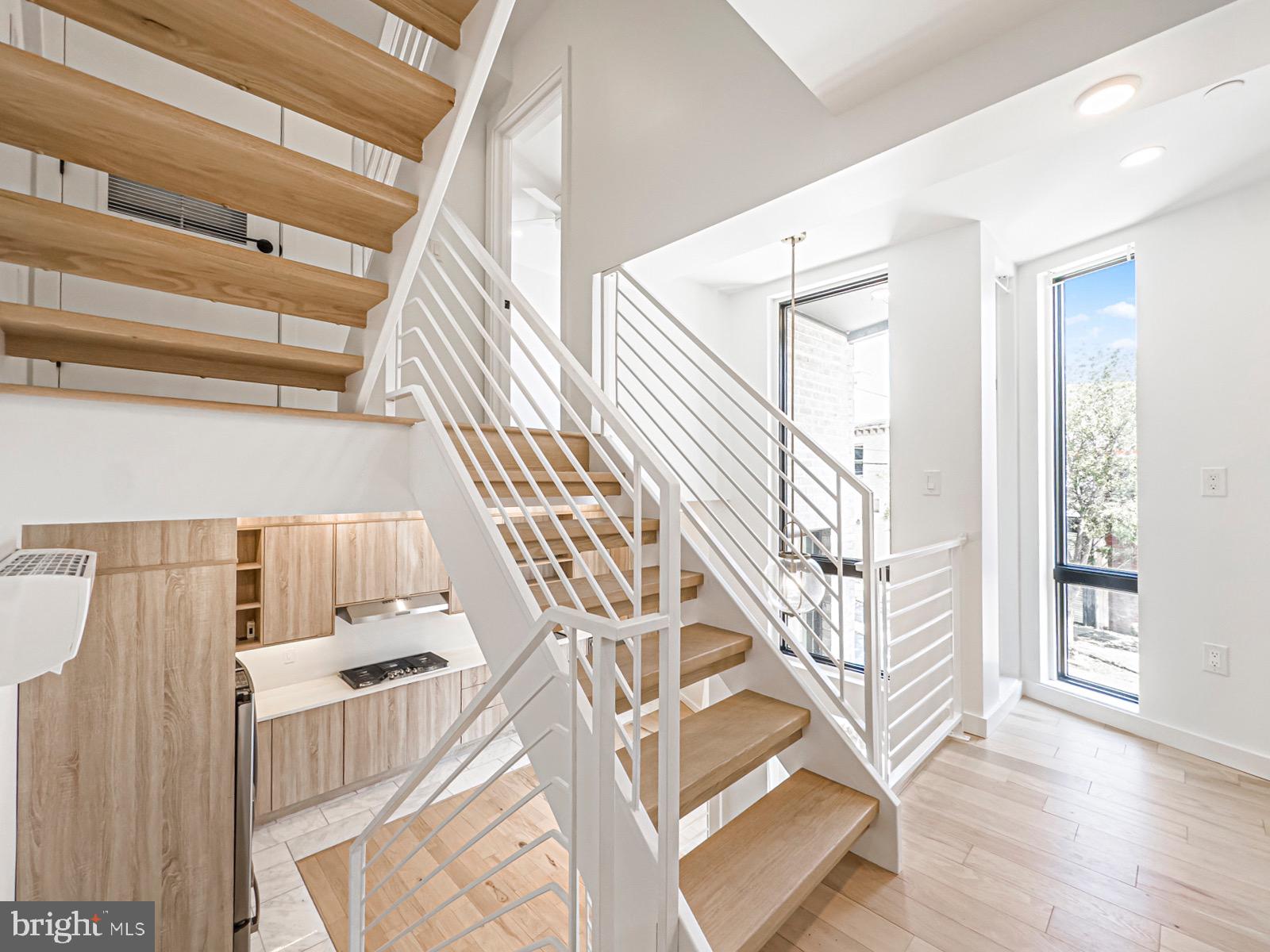 1606 North 4th Street Philadelphia, PA 19122 - Photo 53 of 82 Modern staircase with bright, airy design.