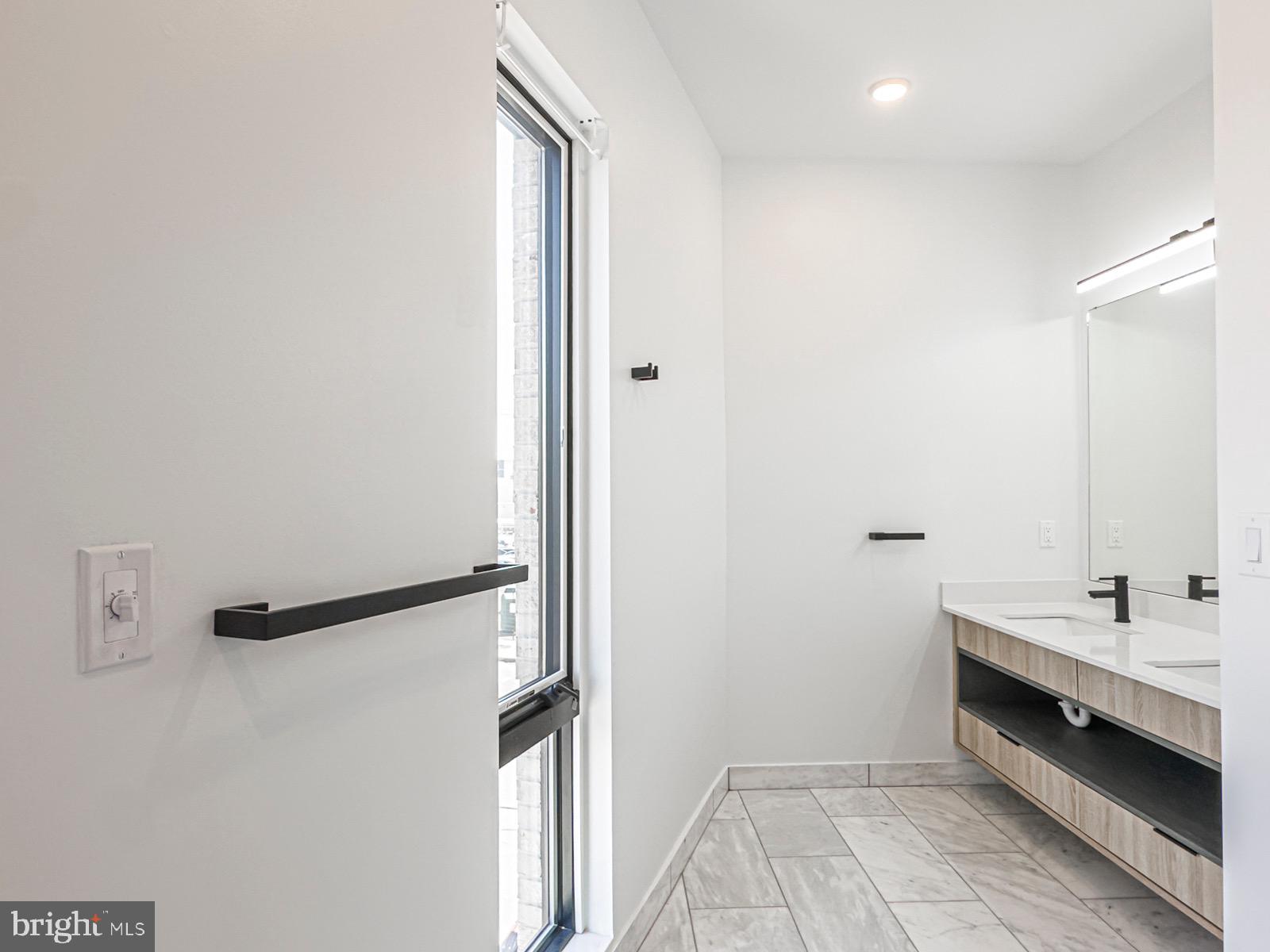 1606 North 4th Street Philadelphia, PA 19122 - Photo 62 of 82 Sleek modern bathroom with natural light.