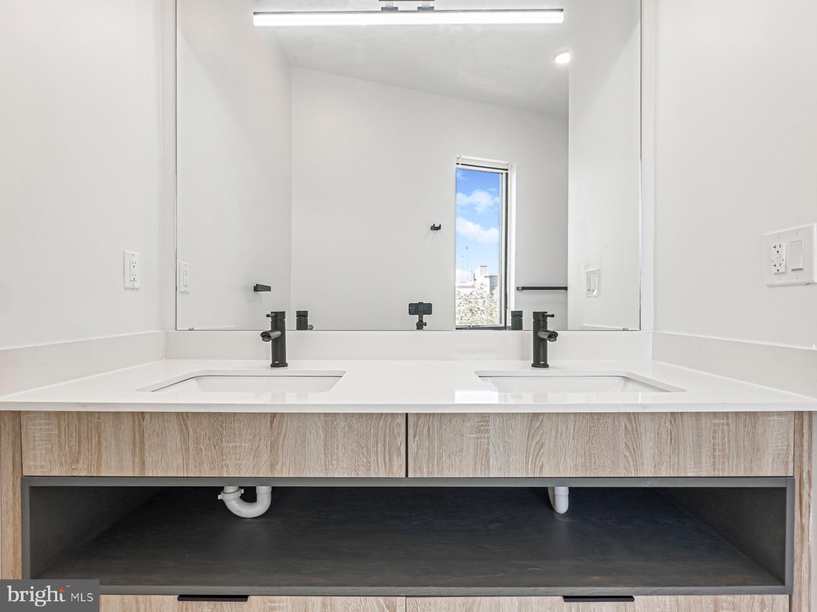1606 North 4th Street Philadelphia, PA 19122 - Photo 66 of 82 Sleek modern bathroom with natural light.