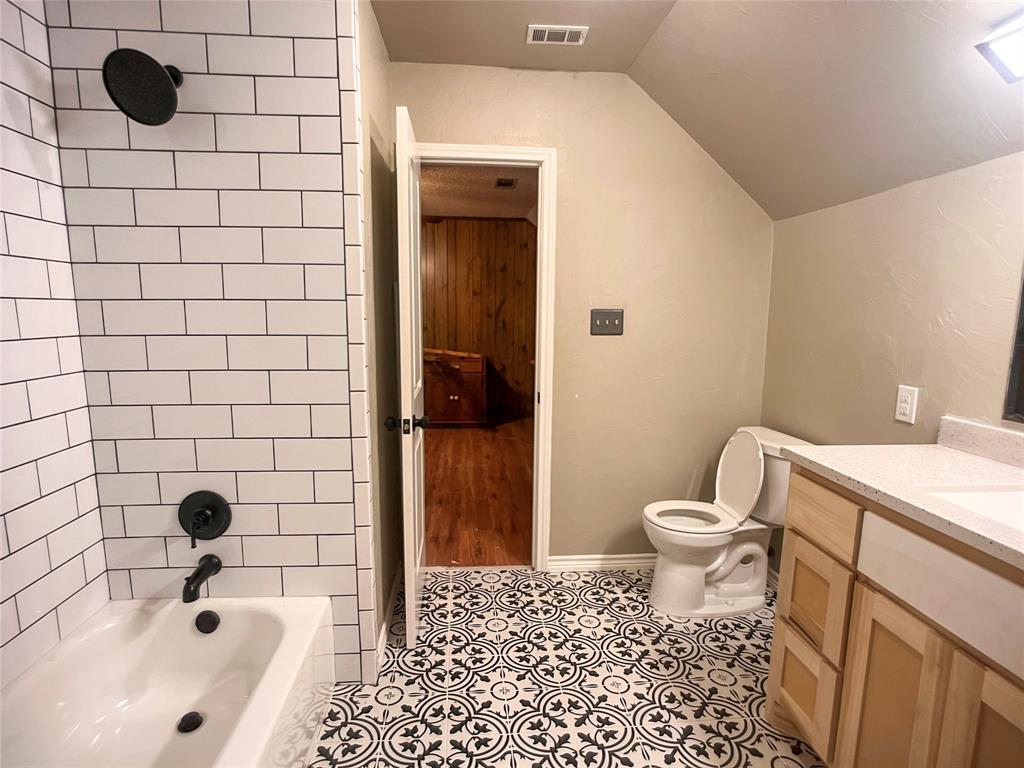107 Private Road Whitney, TX 76692 - Photo 11 of 29 a bathroom with a sink toilet and shower