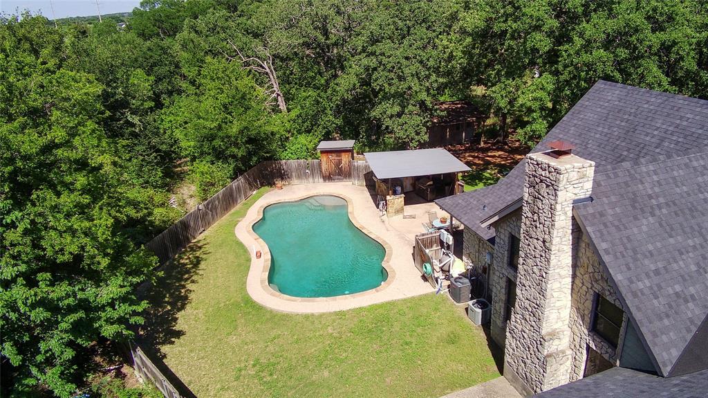 107 Private Road Whitney, TX 76692 - Photo 24 of 29 an aerial view of a house with outdoor space and swimming pool