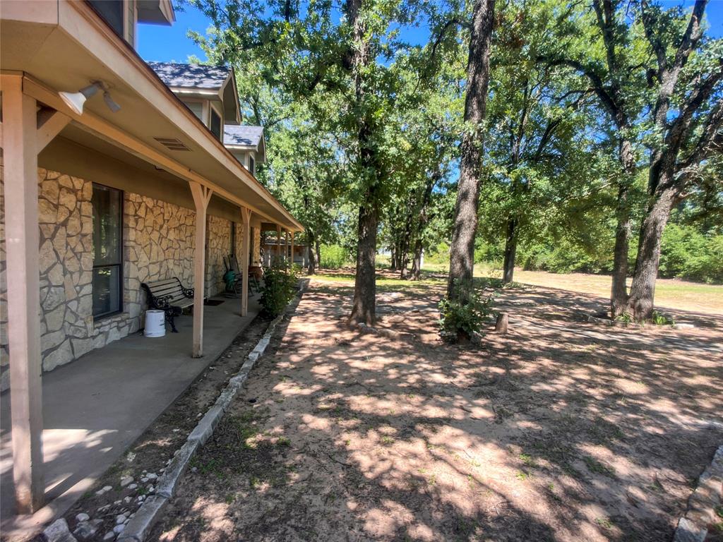107 Private Road Whitney, TX 76692 - Photo 27 of 29 a view of outdoor space with seating area