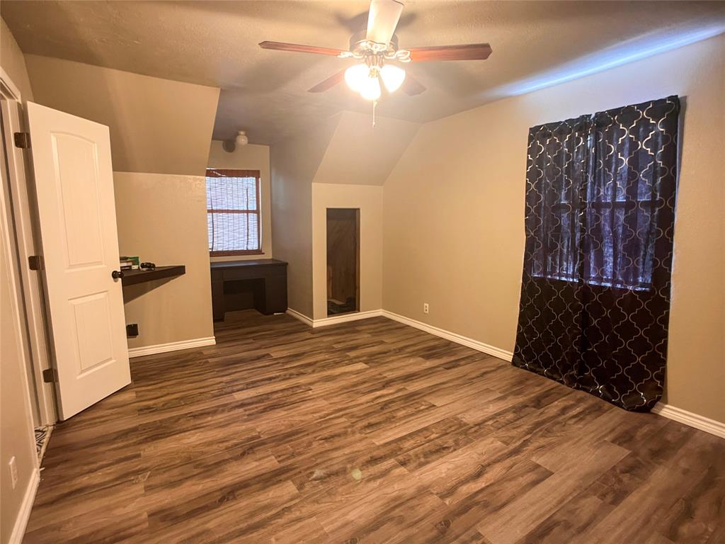 107 Private Road Whitney, TX 76692 - Photo 10 of 29 a view of empty room with wooden floor