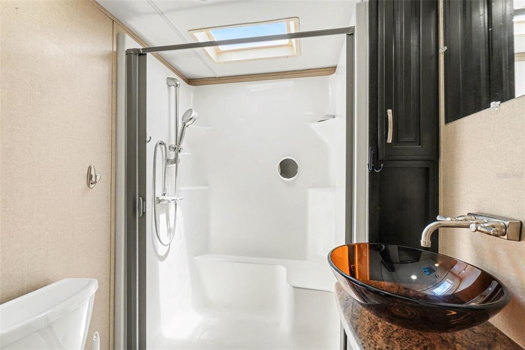 6800 Golf Course Boulevard, Unit H6 Punta Gorda, FL 33982 - Photo 11 of 15 a bathroom with a sink and a mirror