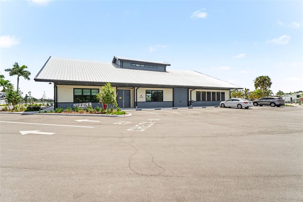 6800 Golf Course Boulevard, Unit H6 Punta Gorda, FL 33982 - Photo 15 of 15 a front view of a building with street
