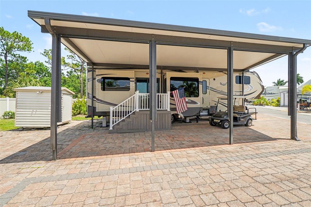 6800 Golf Course Boulevard, Unit H6 Punta Gorda, FL 33982 - Photo 2 of 15 a view of a entryway door front of house