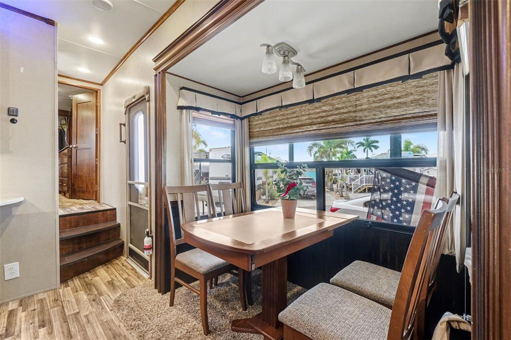 6800 Golf Course Boulevard, Unit H6 Punta Gorda, FL 33982 - Photo 7 of 15 a view of a room with furniture and wooden floor
