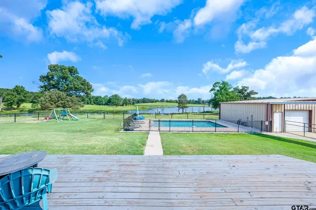 a view of a terrace with yard