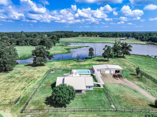 a view of a garden with houses