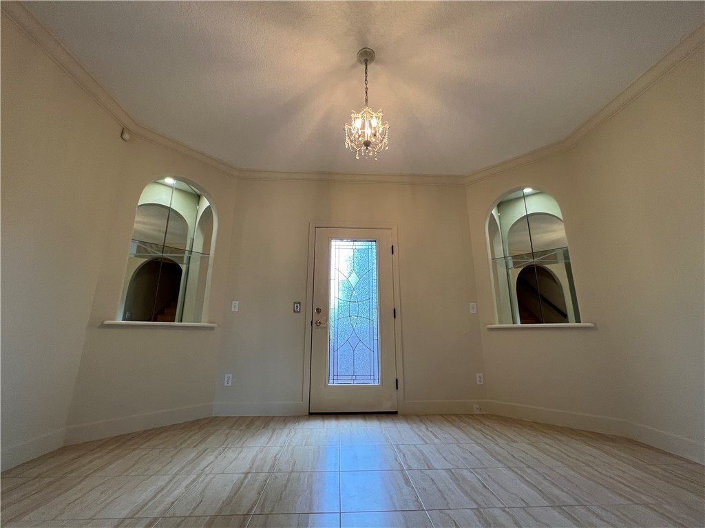 133 Yellow Blf Lane Brunswick, GA 31520 - Photo 14 of 35 3rd floor foyer between bedrooms with balcony