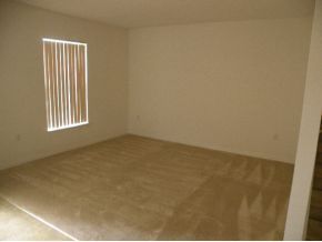 1354 Southeast Rabbit Palm Bay, FL 32909 - Photo 4 of 11 an empty room with windows