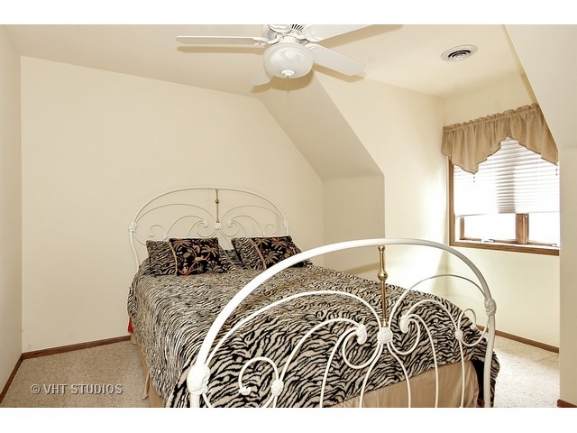 14511 Marengo Road Union, IL 60180 - Photo 17 of 25 a view of a bedroom with a bed