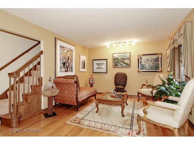 14511 Marengo Road Union, IL 60180 - Photo 4 of 25 a living room with furniture and wooden floor