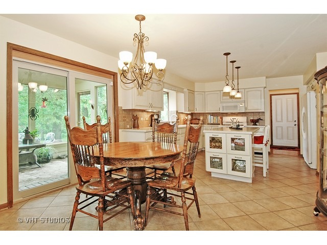 14511 Marengo Road Union, IL 60180 - Photo 6 of 25 a view of a dining room with furniture window and outside view