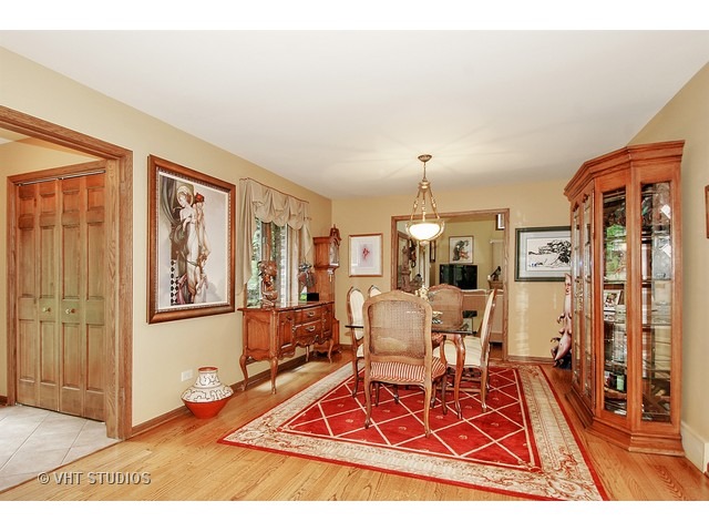 14511 Marengo Road Union, IL 60180 - Photo 7 of 25 a living room with furniture windows and a wooden floor
