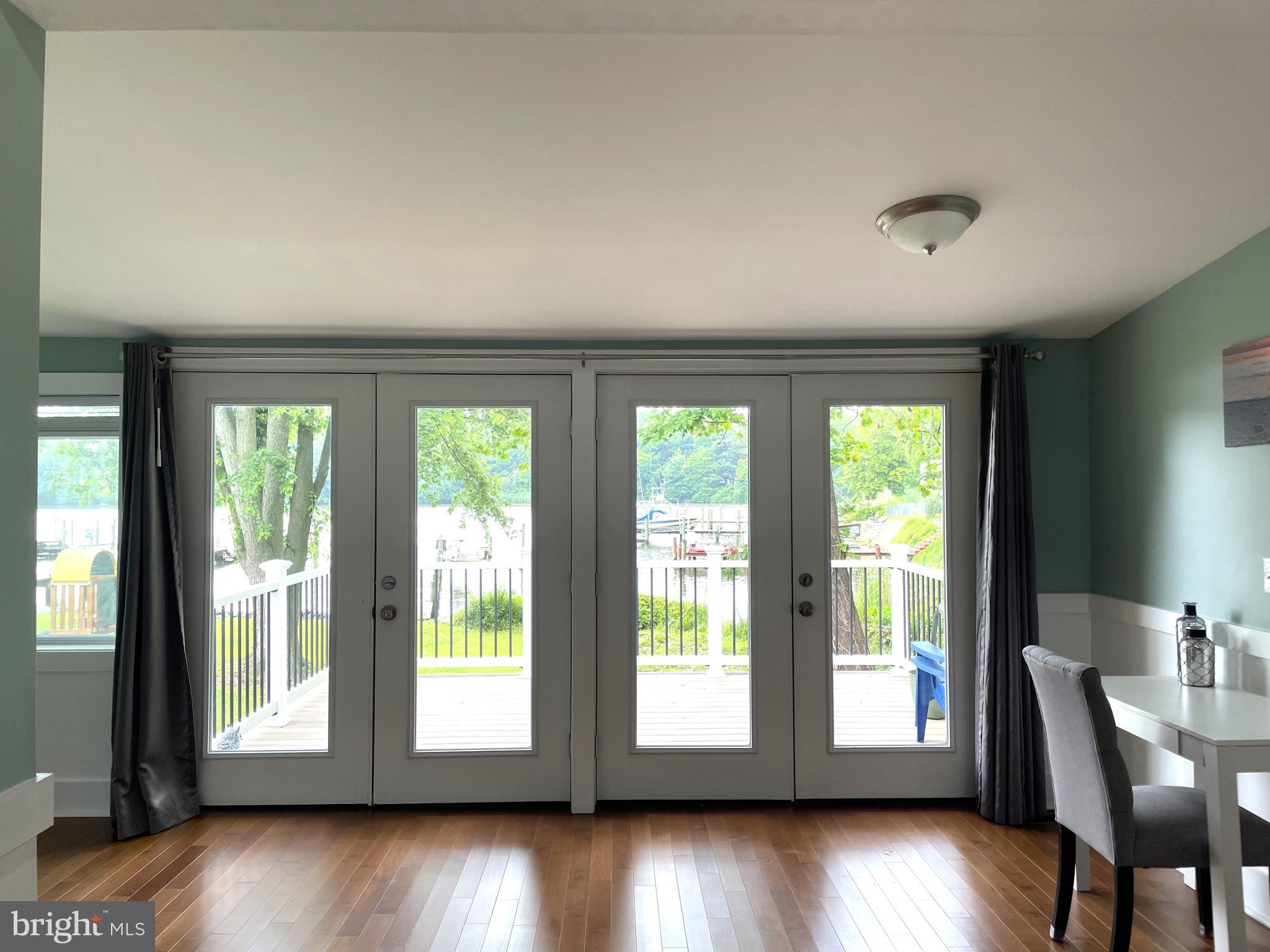 504 Grovethorn Road Middle River, MD 21220 - Photo 10 of 21 2 Sets of Glass doors lead out to spacious deck