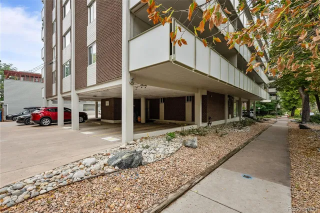 a view of a street with cars