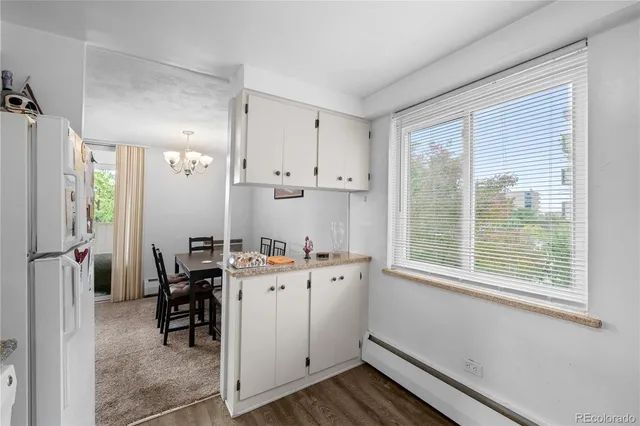 a view of kitchen with breakfast area