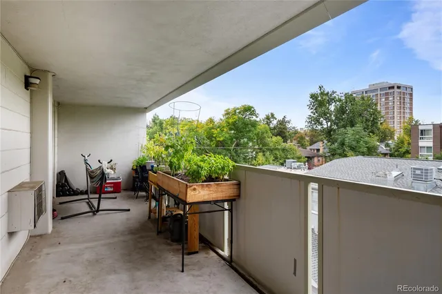 a backyard of a house with outdoor seating