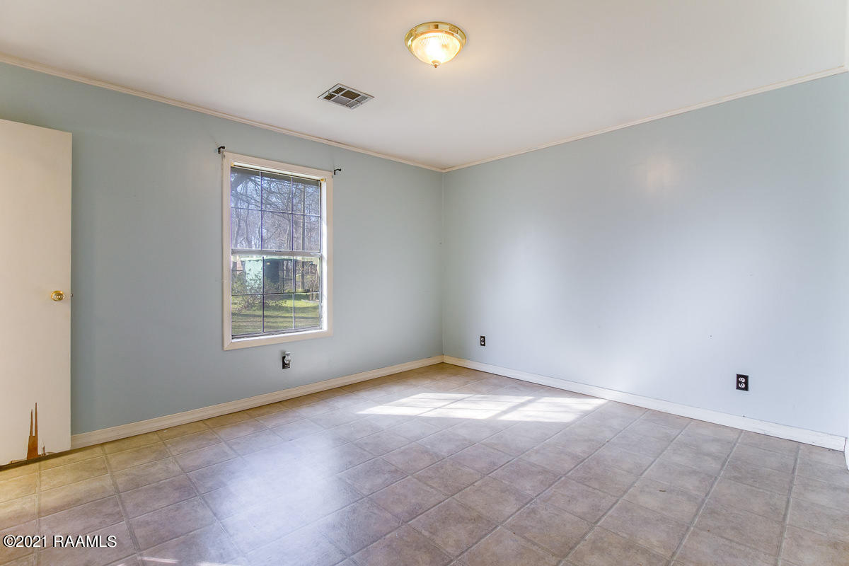 324 Tony Road Church Point, LA 70525 - Photo 12 of 15 324 Tony Road Master Bedroom