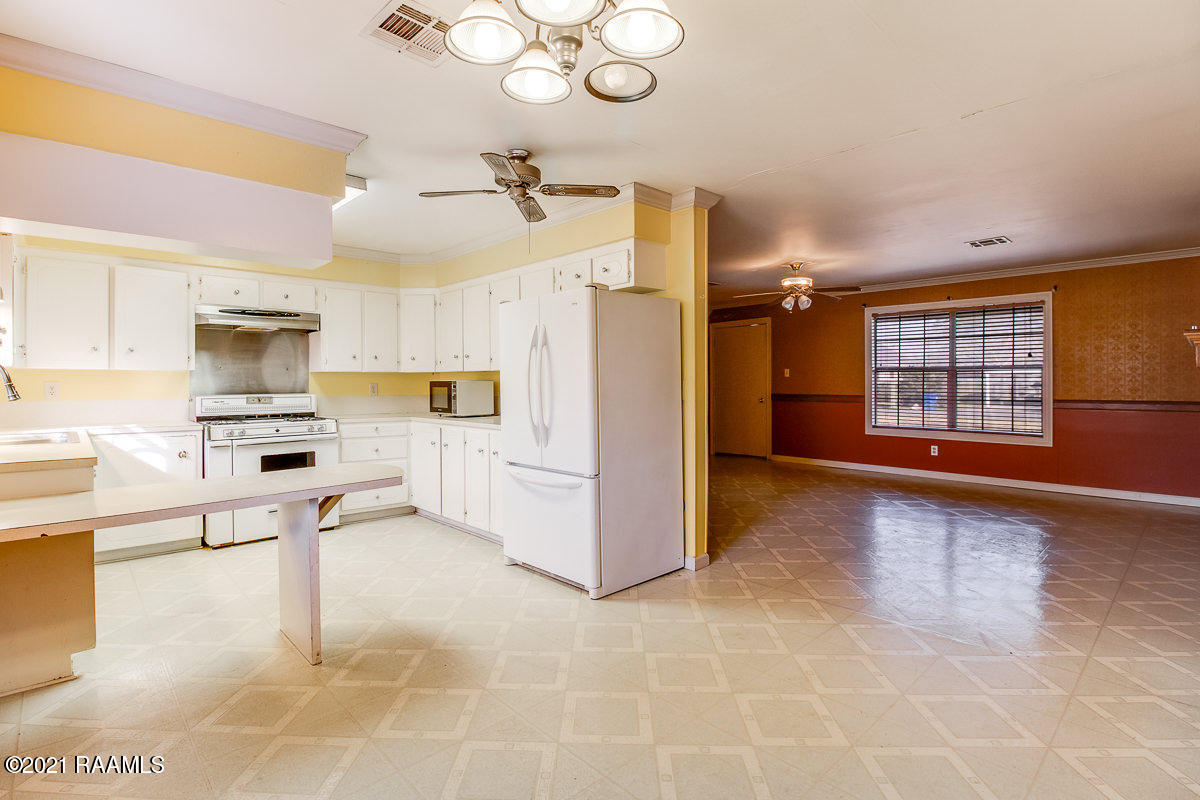 324 Tony Road Church Point, LA 70525 - Photo 5 of 15 324 Tony Rd Kitchen and Living Room