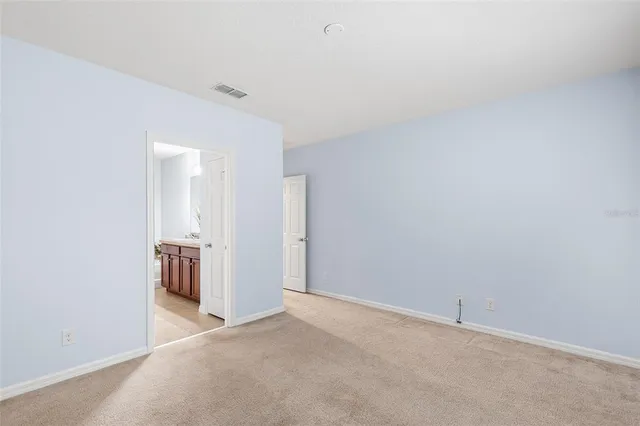 a bathroom with a sink a mirror and a bathtub