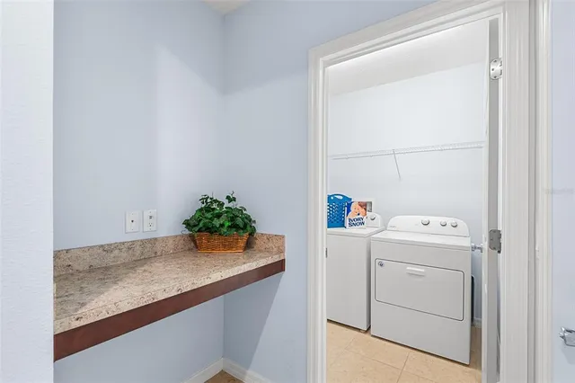 a view of a kitchen with a sink and a microwave