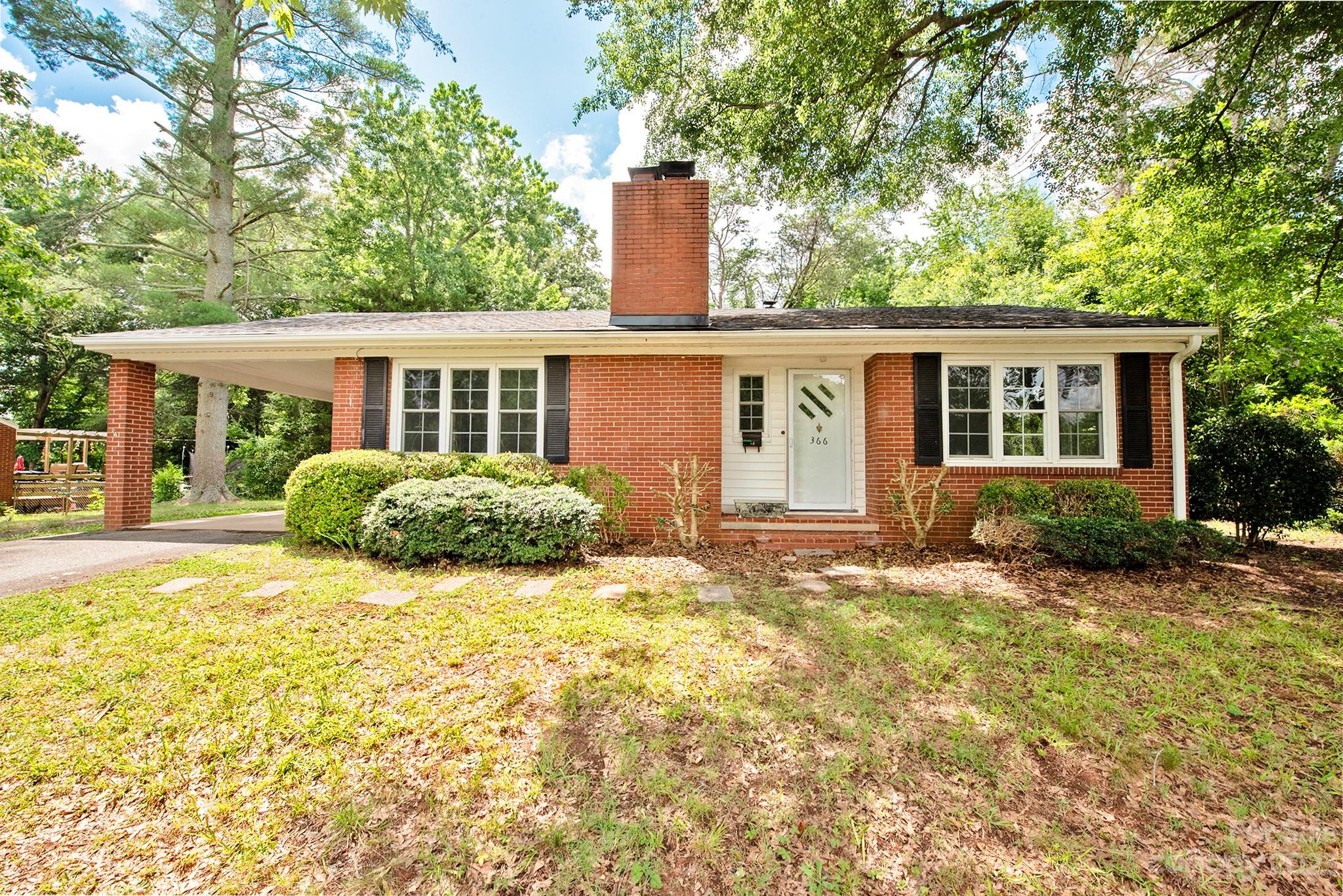 front view of a house with a patio