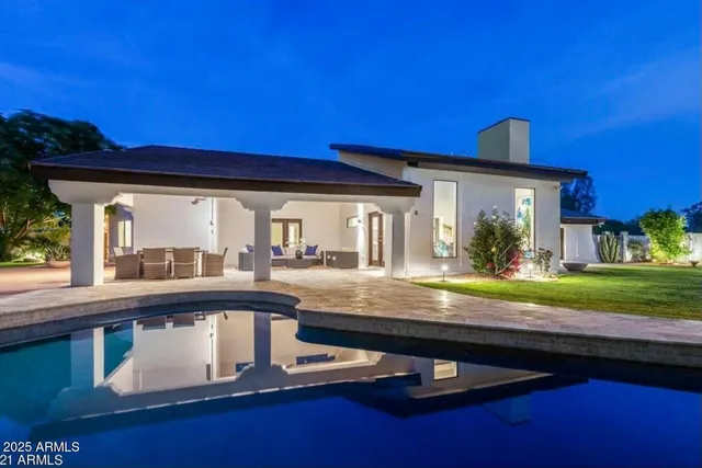 a view of swimming pool with couch
