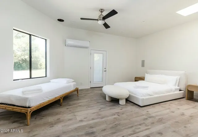 a bathroom with a granite countertop sink mirror and