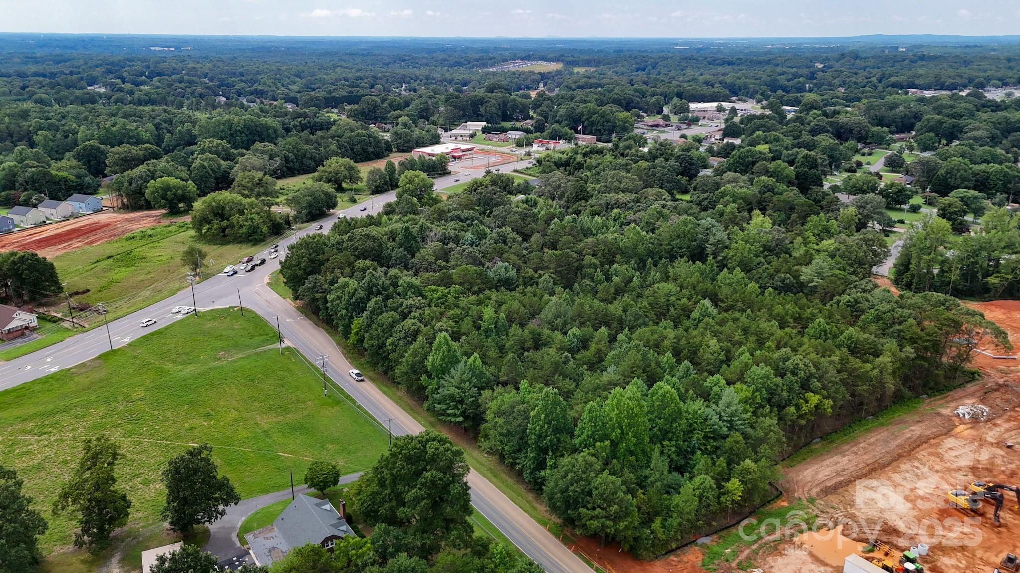 0 Kool Park Road Northeast Hickory, NC 28601 - Photo 4 of 18 an aerial view of residential houses with outdoor space and trees