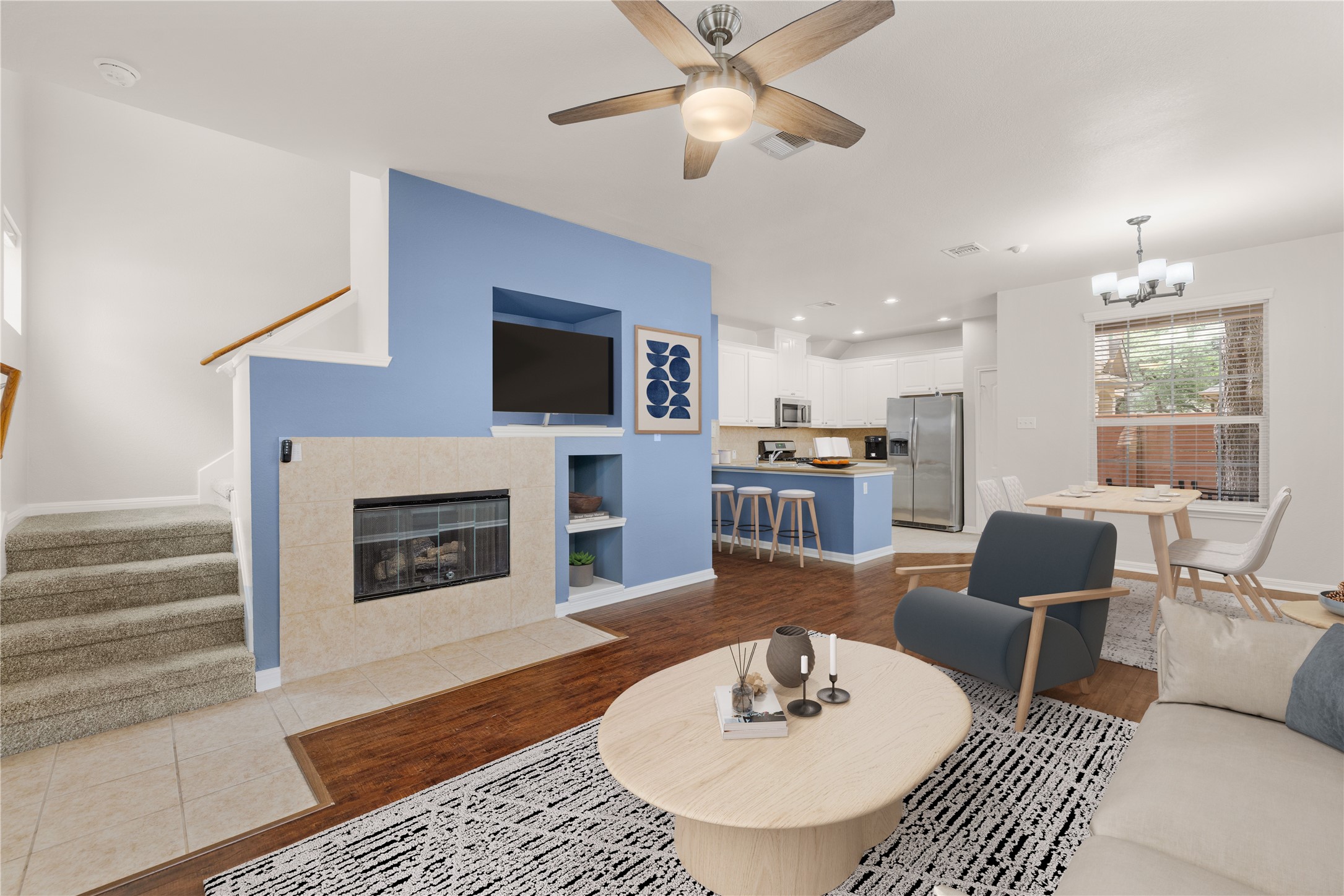 11000 Anderson Mill Road, Unit 45 Austin, TX 78750 - Photo 2 of 32 a living room with furniture and a fireplace